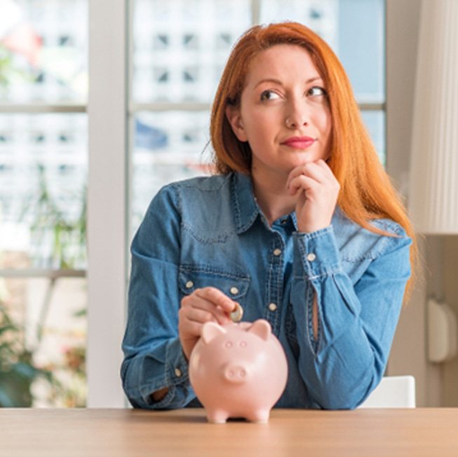 Woman with piggy bank