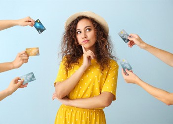 Woman surrounded by credit cards