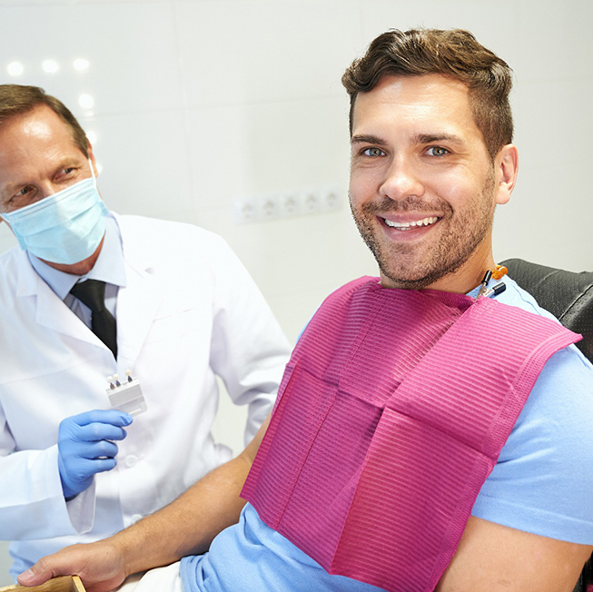 Dentist discussing dental crowns in Corpus Christi