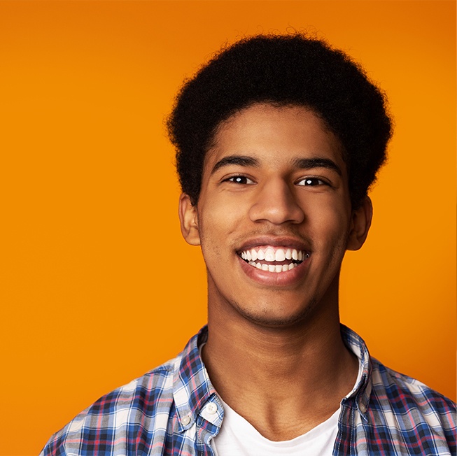 Young man's flawless smile after icon treatment