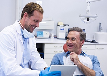 Man smiling at dentist in Corpus Christi