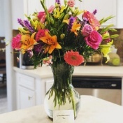 Vase of flowers on dental office reception desk