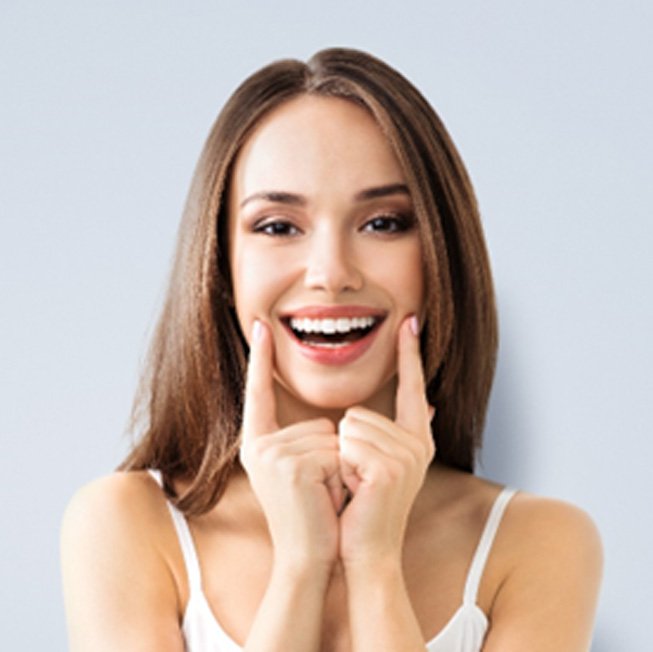 woman happy about her smile makeovers in Corpus Christi 