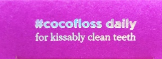 coco floss for kissably clean teeth sign