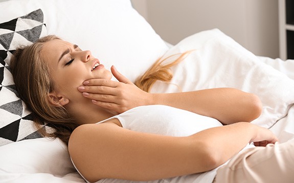 Woman with tooth pain