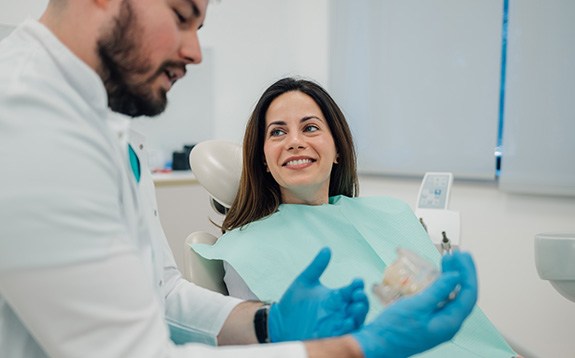 Woman smiling in the dental chair