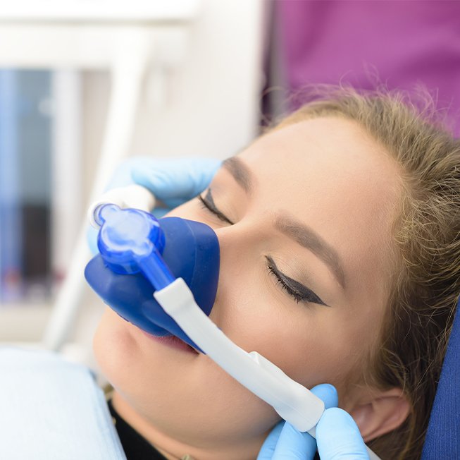 Relaxed dental patient with nitrous oxide sedation dentistry