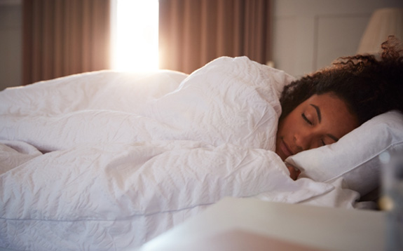 Woman undergoing home sleep test